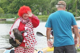 Rosie the Clown from the Cataraqui Canoe Club welcomed the paddlers.